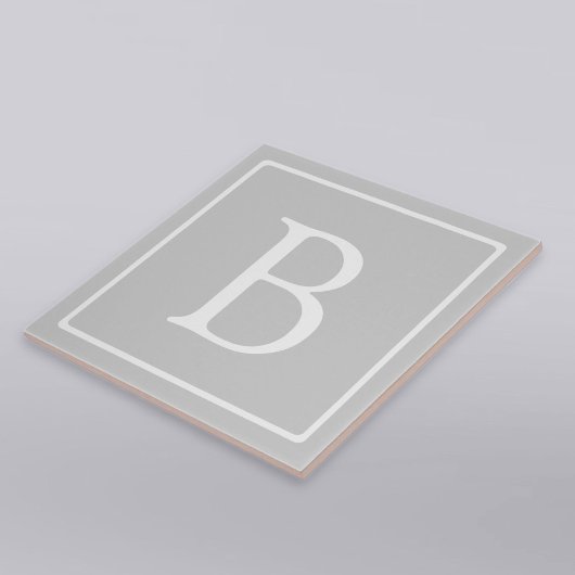 Einfache hellgraue Monogramm Fliese