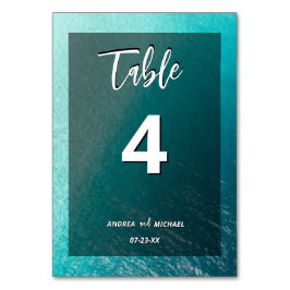 Einfache Hochzeitsfeier am Strand Tischnummer