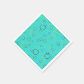 Einfache Limone und braune Kreise auf türkisfarben Serviette (Ecke)