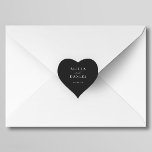 Einfache, minimalistisch-elegante schwarze Gastges Herz-Aufkleber<br><div class="desc">Eleganter,  schlichter,  schwarzer Geschenksticker in Schwarz-Gastgeschenk Hochzeit mit einem stilvollen,  schicken Kalligraphieskript.                       Einfach mit Ihren Daten personalisieren! Geeignet für feierliche,  neutrale Hochzeiten.                 Bitte beachten Sie,  dass die Hintergrundfarbe an Ihre Hochzeitfarbe angepasst werden kann. Wenn Sie es bequem machen,  können Sie es ändern,  nachdem Sie die IT-Option CUSTOMIZE ausgewählt haben.</div>