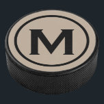 Einfache Schwarz-Monogramm-Initial Eishockey Puck<br><div class="desc">Die minimale mit Monogramm Gestaltung ist mit einem Schwarz-Beige-Monogramm-Medaillon in einer weißen klassischen Blocktypografie gestaltet. Personalisieren Sie mit Ihrem ersten.</div>
