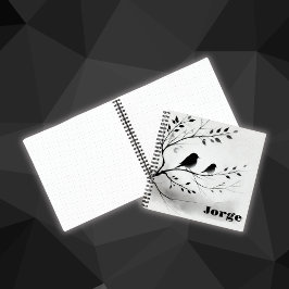 Einfache Schwarz-Weiß-Vögel, die in Bäumen herumbl Notizblock