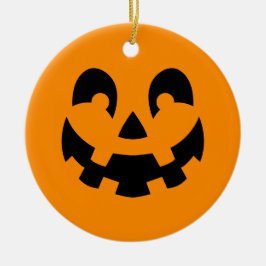 Einfache schwarze Kürbisgesicht an orangefarbenem  Keramik Ornament