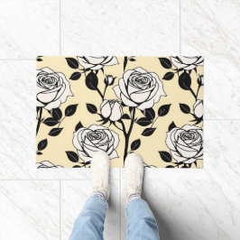 Einfache schwarze und weiße Rosen in einem grafisc Fußmatte