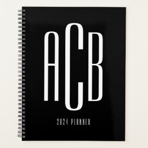 Einfache Schwarzweißfarben und Weiß mit drei Buchs Planer