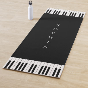 Einfache und elegante Piano-Tastatur in Schwarz un Yogamatte