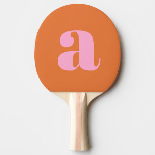 Einfaches rosa und orangefarbene, fettes Retro-Mon Tischtennis Schläger