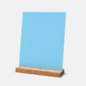 Einfarbiger hellblauer Hintergrund, gleichmäßig ge Acrylschild (Winkel)