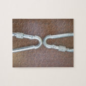 Eingeklemmt: Design der Stahlkarabiner-Verriegelun Puzzle (Horizontal)