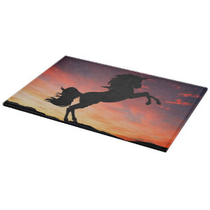 Einhorn-Silhouette am Sonnenuntergang auf Edgeboar Schneidebrett