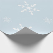 Eisiges Pastellblau mit weißem Weihnachten der Geschenkpapier (Ecke)