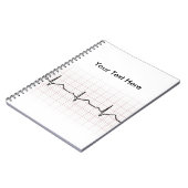 EKG Herzschlag auf Zeichenpapier mit Notizblock (Linke Seite)