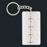 EKG Herzschlag auf Zeichenpapier mit Schlüsselanhänger<br><div class="desc">Ob Sie ein Doktor, Krankenschwester, Sanitäter, Patient, PhD-Student oder Besuchen eines Freunds im Krankenhaus sind, ist dieses Medizin bezogene Geschenk entworfen, um Herzschlag schneller zu machen. Es stellt ein EKG Diagramm auf dem Zeichenpapier mit Maßeinteilung dar und zeigt das Schlagen eines Herzens. Ich schätze, dass es das eines Impulses auch...</div>