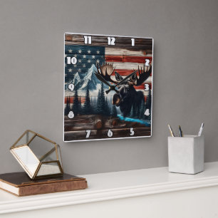 Elchköpfe gegen amerikanische Flagge und Berge Quadratische Wanduhr