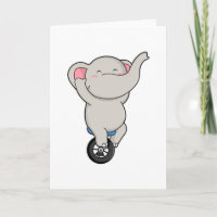 Elefant als Künstler bei Zirkus mit Reifen