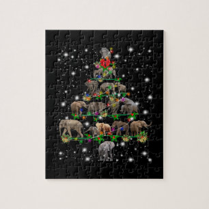Elefantenweihnachtsbaum mit leuchtendem Licht Puzzle