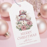 Elegant Floral Christmas Snowman Geschenkanhänger<br><div class="desc">Fügen Sie Ihrem Weihnachtsgeschenk in dieser Saison eine besondere Touch mit unseren eleganten, rosa, grün und weiß blühenden Weihnachtsschneemannsmarken hinzu. Diese atemberaubenden Geschenketiker haben einen wunderschön gestalteten Aquarell-Schneemann, der in typografischem Schriftart "Frohe Weihnachten" geschrieben steht. Aber das ist noch nicht alles - diese Geschenketiketten sind vollständig anpassbar! Fügen Sie eine...</div>