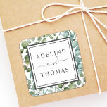 Elegant Geometric Greenery Wedding Monogram Quadratischer Aufkleber<br><div class="desc">Elegante Hochzeitsticker sind im modernen Bio Stil gestaltet und kombinieren einen geometrischen quadratischen Rahmen mit botanischem grünem Blattwerk und wunderschöner Typografie. Das Aquarell-Design umfasst Eukalyptus, Blätter und Eukalyptuszweige in sanften grünen Minztönen, Grün, Oliven und Blau. Ideal für einen Frühlings- oder Sommeraufenthalt. Der schwarze Hochzeitsmonogramm-Text kann mit den Braut- und Bräutigamen...</div>