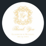 Elegant Gold Monogram Wedding Crest Thank You Runder Aufkleber<br><div class="desc">These elegant classic gold wedding monogram thank you stickers are perfect for favors, place cards, and more. They feature an ornate vintage crest with intertwined fancy script calligraphy monogram, and script Thank You. Find matching products in the collection, or message me through Zazzle Chat for more products and design tweaks....</div>