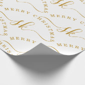 Elegant Gold Script Name Monogram Frohe Weihnachte Geschenkpapier (Ecke)