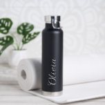 Elegant Personalized Name Script Water Bottle Trinkflasche<br><div class="desc">Stay hydrated in style with this Elegant Personalized Name Script Water Bottle. Featuring a sophisticated, hand-written cursive font on a clean matte black finish, this thermal bottle is designed for the modern minimalist. Its "human-centered" design makes it a thoughtful, high-end gift for bridesmaids, birthdays, or your own daily routine. Keeps...</div>