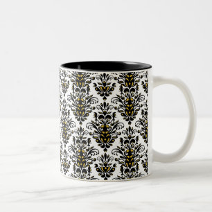 Elegant schwarz-weiß mit einer Note von Gold-Damas Zweifarbige Tasse
