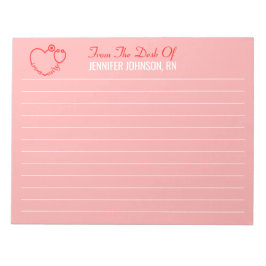 Elegant vom Schreibtisch des nurse Stethoscope nam Notizblock