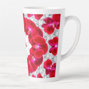 Elegante Anordnung roter Orchideen Milchtasse