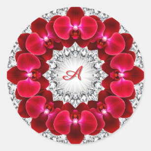 Elegante Blumenanordnung mit roten Orchideen Runder Aufkleber