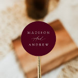 Elegante Calligraphy Burgundy Wedding Runder Aufkleber<br><div class="desc">Einfache,  kalligraphische Hochzeitsaufkleber mit ihren Namen in weißer Schrift mit bordeauxrotem Hintergrund. Die weinroten Hochzeitsaufkleber eignen sich hervorragend für Umschlag Aufkleber,  Gastgeschenke Hochzeiten und vieles mehr! Die eleganten Hochzeitsaufkleber wurden entworfen,  um sich mit unserer Hochzeitskollektion "Elegant Calligraphy Burgundy" abzustimmen.</div>