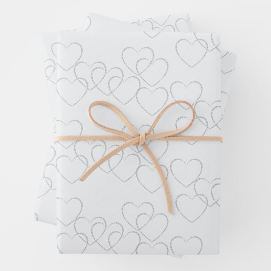 Elegante dekorative Silberherz-Charme auf Weiß Geschenkpapier Set (Beispiel)