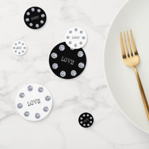 Elegante Diamanten auf schwarzem und weißem Tisch Konfetti