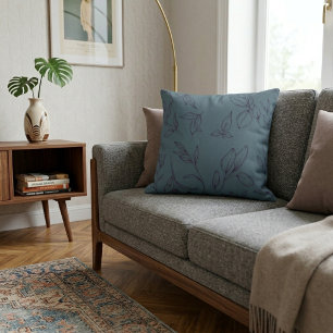 Elegante einfache botanische Blätter auf Blau Kissen