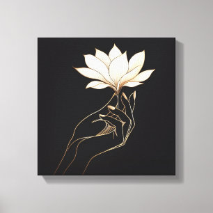 Elegante feminine Hand mit Magnolienblüte Leinwanddruck
