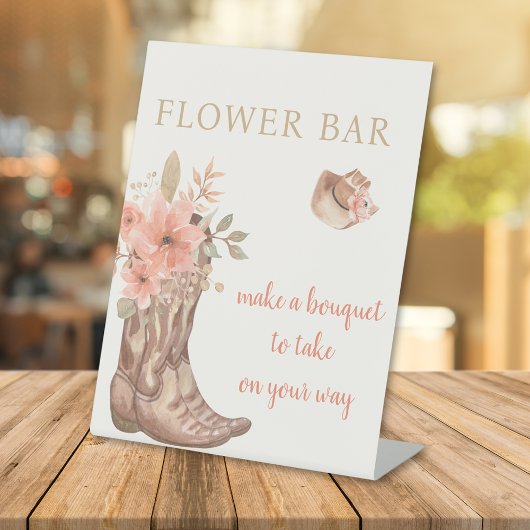 Elegante florale Cowboystiefel machen ein Bouquet Sockelschild