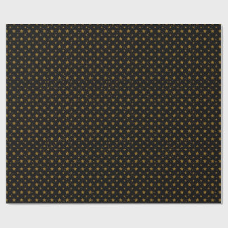 Elegante goldene Metallsterne auf schwarzem Gesche Geschenkpapier