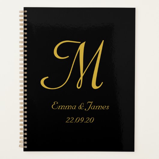 Elegante moderne Black Gold Monogram Script Hochze Planer (Vorderseite)