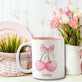 Elegante, moderne rosafarbene Kirschen mit rosafar Zweifarbige Tasse