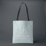 Elegante Personalisierte Bridesmaid in Schwarz und Tasche<br><div class="desc">Elegante Personalisierte Bridesmaid-Geschenke in Schwarz und Weiß mit personalisierten Monogrammen im eleganten Schriftart-Stil mit dem Namen und dem Titel der Brautjungfrau im klassischen Serif-Schriftart-Stil auf schlauem, grünem Hintergrund. Auch perfekt für die Trauzeugin, Blumenmädchen, Brautmutter und vieles mehr.</div>