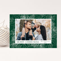 Elegante Poinsettien und Pinienzapfen grünes Foto