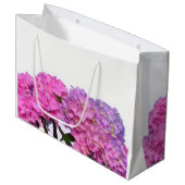 Elegante, rosa, lila Blumendörfchen Hydrangeas Große Geschenktüte (Vorderseite Schrägansicht)