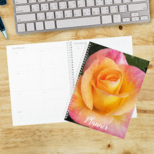 Elegante rosa und gelbe Rosenblüten Planer