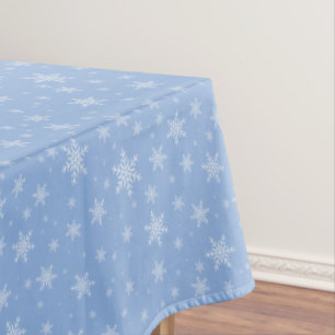 Elegante Schneeflocken auf hellblauem Tablecloth Tischdecke