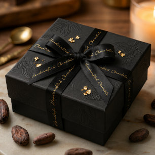 Elegante schwarze goldene handgefertigte Schokolad Satinband