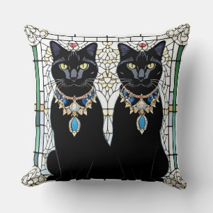 Elegante schwarze Katzen mit Schmuck Kissen