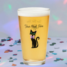 Elegante sitzende schwarze Katze große grüne Augen