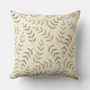 Elegante tropische Blätter auf Champagner-Beige Kissen