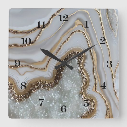 Elegante Uhr an der Wand aus weißem und goldenem T (Vorderseite)