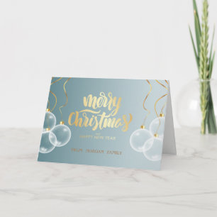 Elegante Weihnachtsbälle in Weiß auf blauem Weihna Feiertagskarte