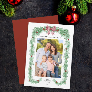 Elegante Weihnachtsgirlande mit Schleife Foto Feiertagskarte